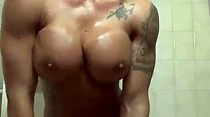 Fit female bodybuilder with voluptuous breasts